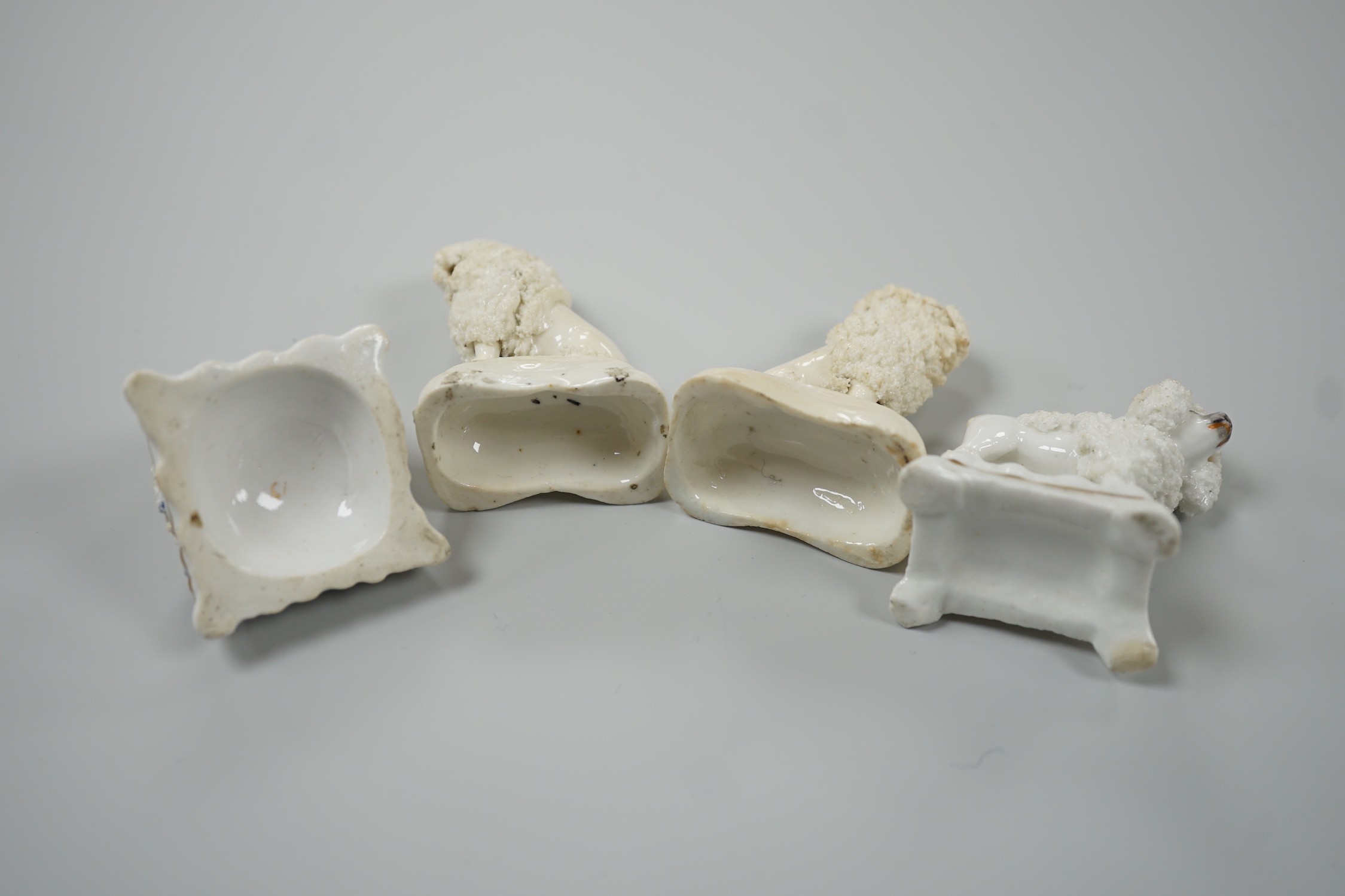 Four toy Staffordshire models of poodles, to include a pair, c.1830-50, (4). Tallest 5cm, Provence: Dennis G. Rice collection, Cf. Dennis G.Rice Dogs in English porcelain, colour plate 113